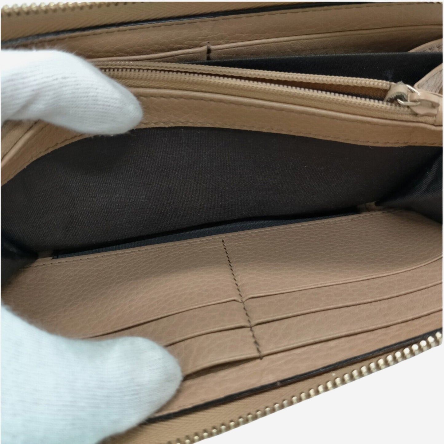 Gucci Beige Pebbled Leather Full-Sized Zip Around Wallet