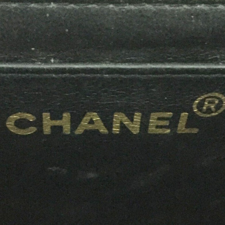 Chanel Black Caviar Vertical Jumbo Flap